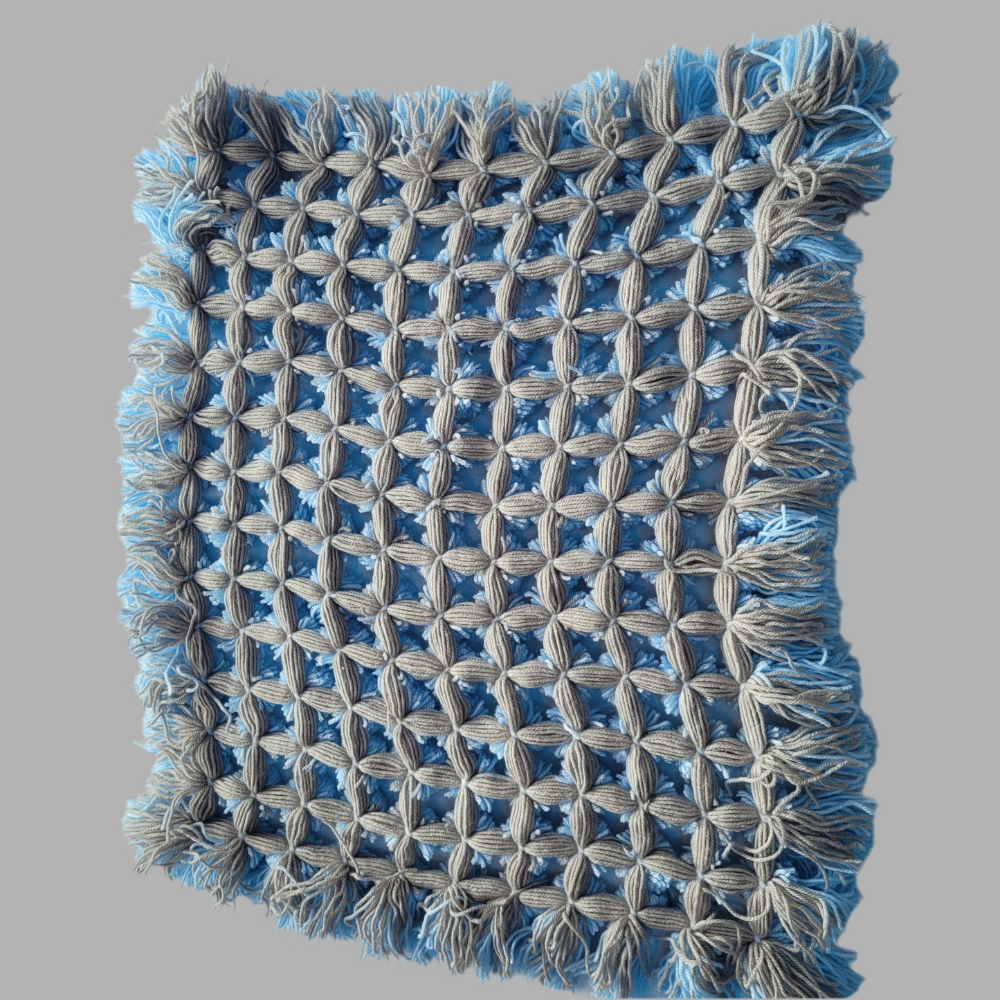 Hand knitted, Pom-Pom Pram blanket