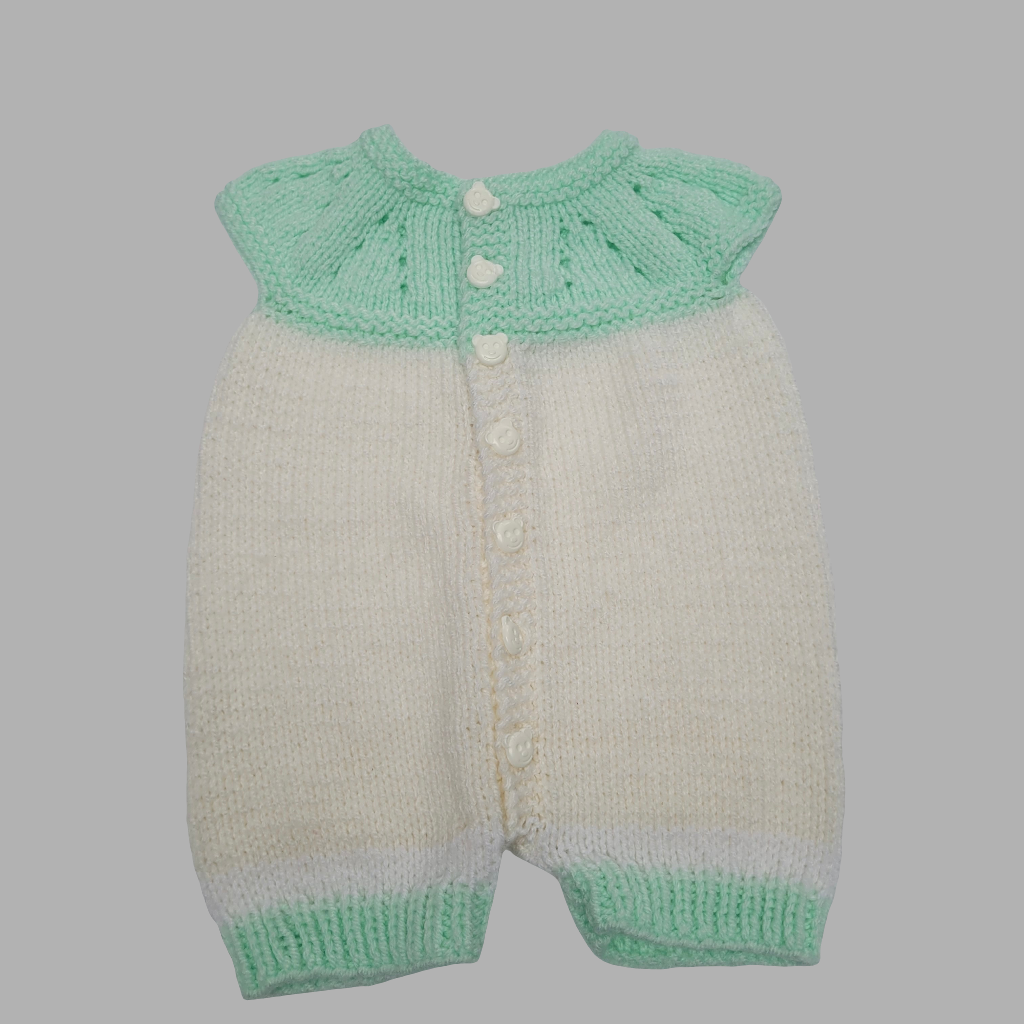 Hand-knitted white and green romper
